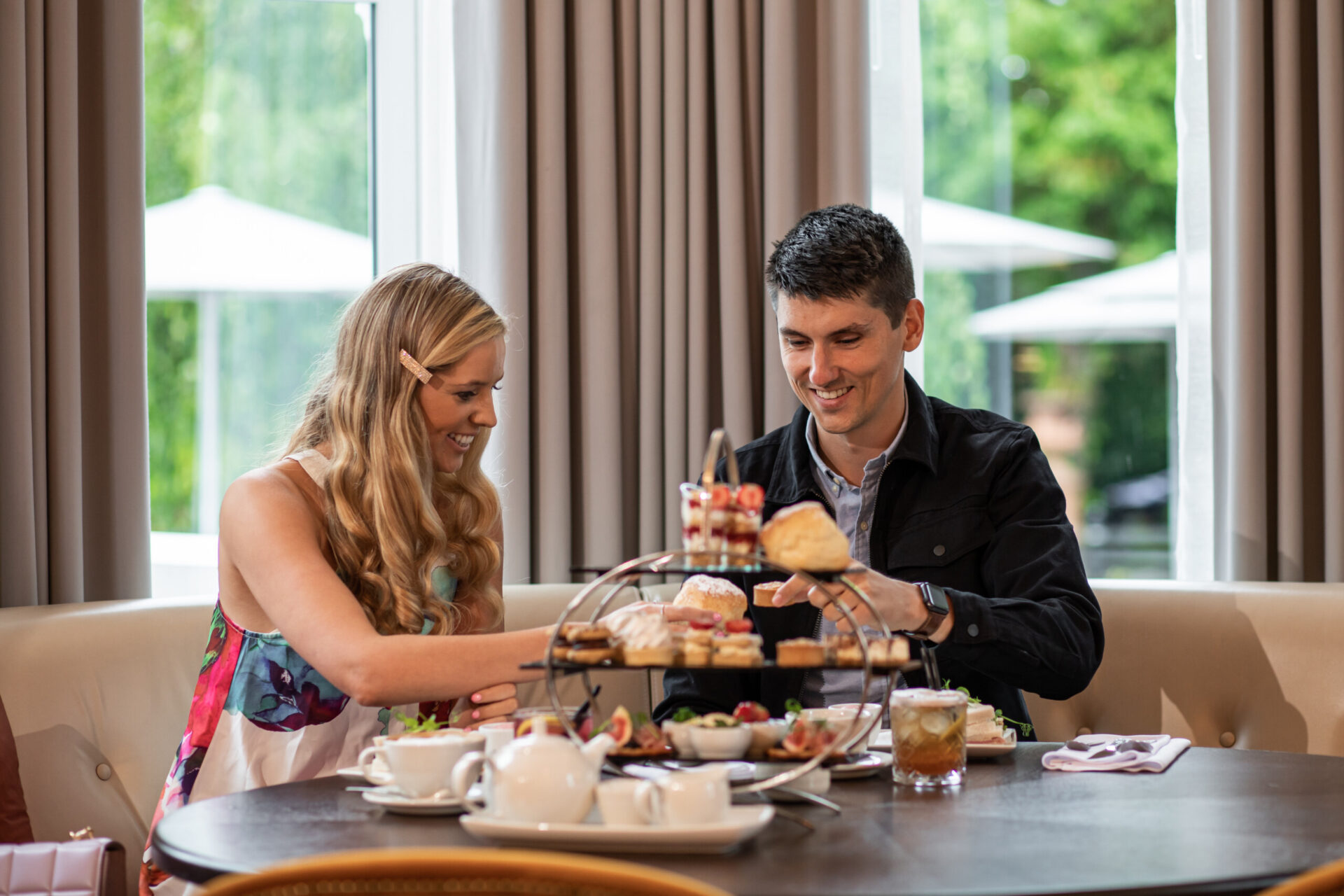 An image of a couple enjoying the Afternoon Tea Experience at Tullyglass Hotel